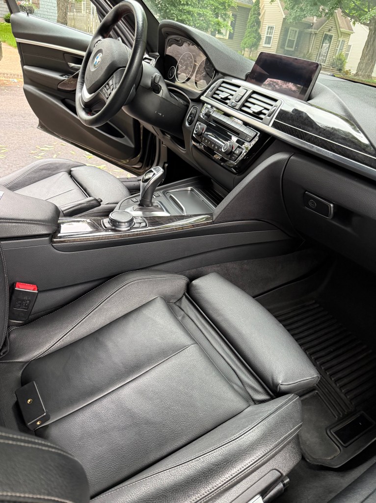 Mobile detailing BMW 3 Series interior seats and carpet cleaned